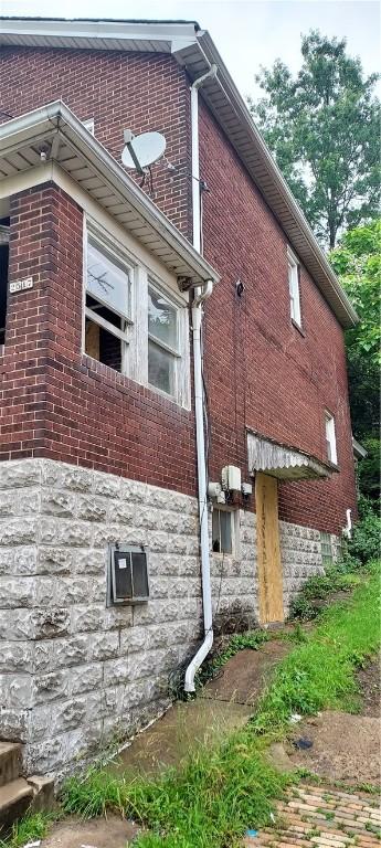2517 S Braddock Ave, Swissvale, PA 15218 - view of side of home featuring brick siding