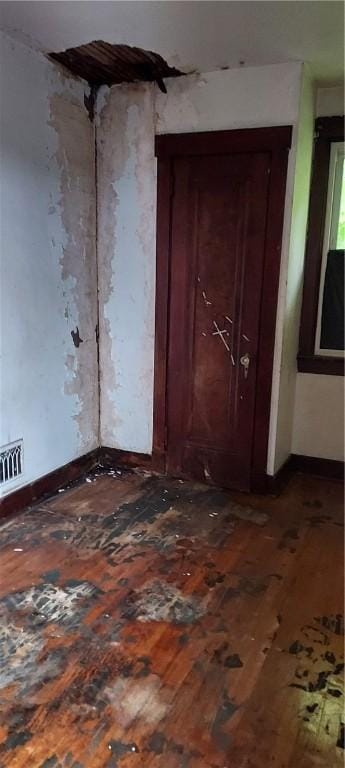 2517 S Braddock Ave, Swissvale, PA 15218 - spare room featuring dark wood-type flooring and baseboards