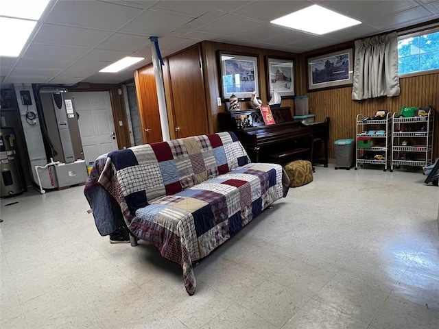 516 Chestnut Ridge Rd, Amwell, PA 15301 - living room with tile patterned floors, wood walls, and a drop ceiling