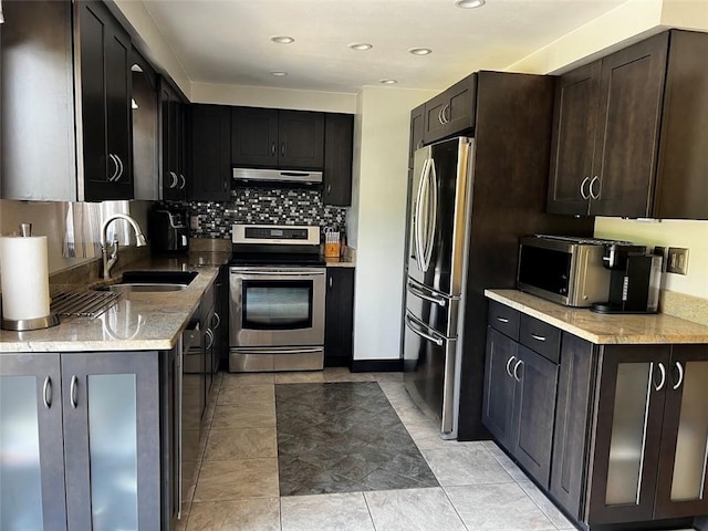 516 Chestnut Ridge Rd, Amwell, PA 15301 - kitchen with stainless steel appliances, under cabinet range hood, tasteful backsplash, recessed lighting, and light stone counters