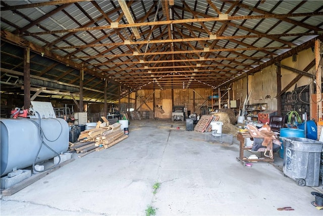 140 Jocelynn Ln, Smithfield, PA 15478 - miscellaneous room featuring oil tank, unfinished concrete floors, and vaulted ceiling