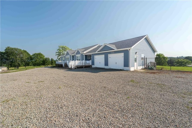140 Jocelynn Ln, Smithfield, PA 15478 - view of front facade with a garage and driveway