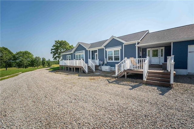 140 Jocelynn Ln, Smithfield, PA 15478 - view of front facade featuring a deck, stairway, and a shingled roof