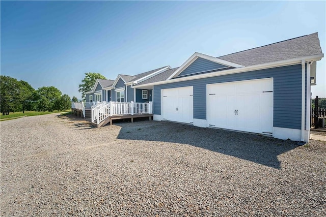140 Jocelynn Ln, Smithfield, PA 15478 - view of front of house with a garage, a deck, and driveway