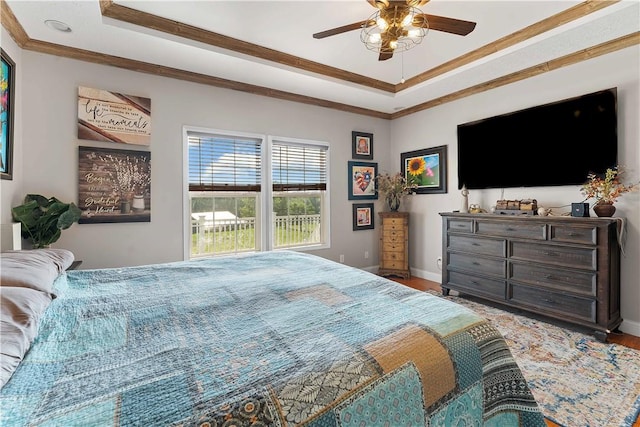 140 Jocelynn Ln, Smithfield, PA 15478 - bedroom featuring a tray ceiling, wood finished floors, crown molding, and a ceiling fan