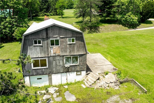4731 National Pike, Wharton Twp, PA 15459 - view of side of home with a gambrel roof and a yard