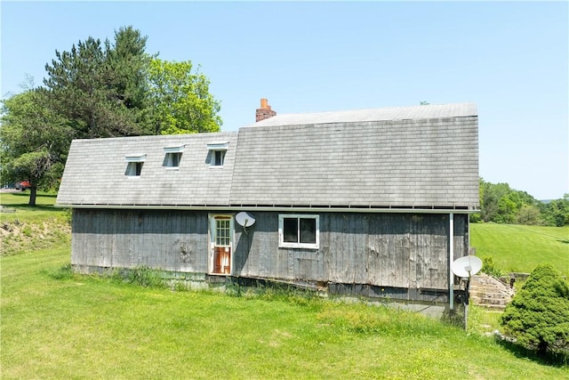 4731 National Pike, Wharton Twp, PA 15459 - back of property with a chimney and a lawn