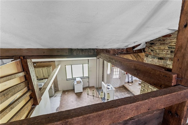 4731 National Pike, Wharton Twp, PA 15459 - stairway with a textured ceiling and lofted ceiling