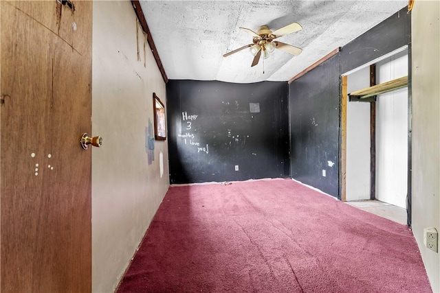 4731 National Pike, Wharton Twp, PA 15459 - unfurnished bedroom featuring carpet, multiple windows, a textured ceiling, and a ceiling fan