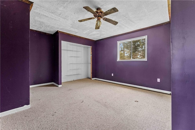 4731 National Pike, Wharton Twp, PA 15459 - unfurnished bedroom featuring carpet floors, a textured ceiling, a closet, and a ceiling fan