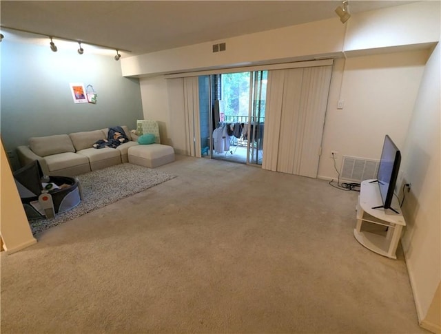 2120 Greentree Rd Unit 309E, Pittsburgh, PA 15220 - living room with carpet floors and track lighting