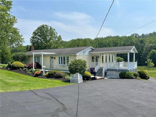 71 Armstrong Dr, Canton Twp, PA 15301 - ranch-style house featuring a porch, a chimney, and a front lawn
