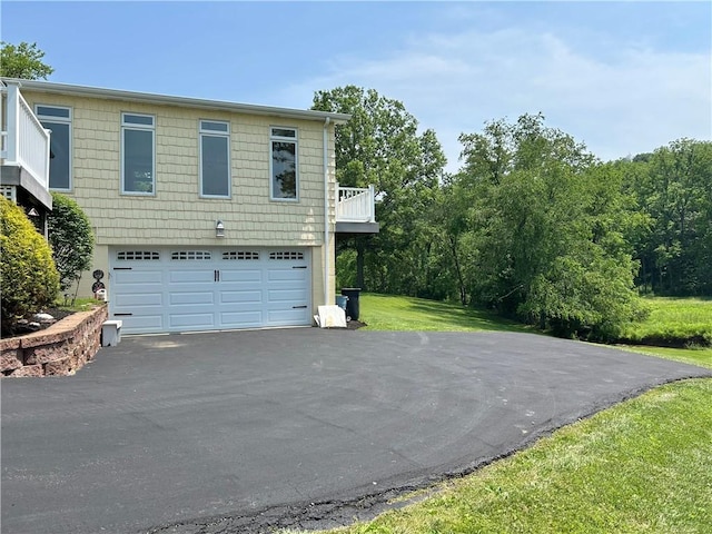 71 Armstrong Dr, Canton Twp, PA 15301 - view of front of property with a garage, driveway, and a front lawn
