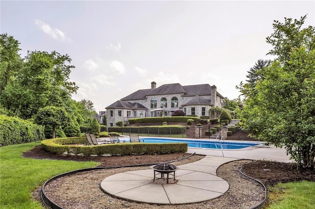 7023 Fair Oaks Dr, Export, PA 15632 - swimming pool featuring a fire pit and a patio area