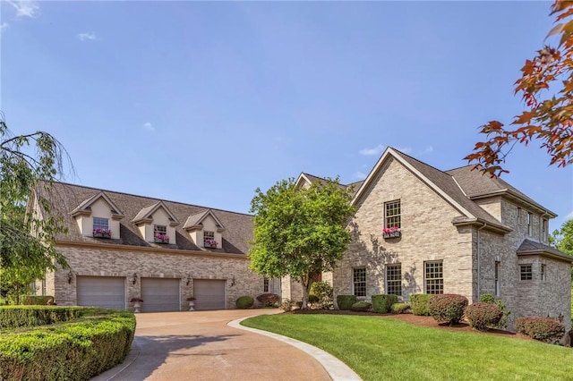 7023 Fair Oaks Dr, Export, PA 15632 - view of front facade featuring brick siding, a front yard, a garage, and concrete driveway