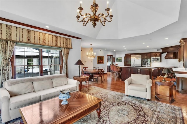 7023 Fair Oaks Dr, Export, PA 15632 - living area featuring a chandelier, light wood-style flooring, and recessed lighting