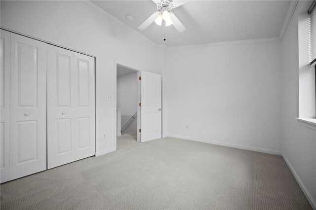 47 S 16th St, South Side, PA 15203 - unfurnished bedroom featuring carpet flooring, crown molding, a ceiling fan, and a closet