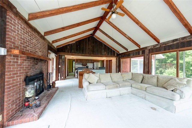 117 Stoneys Ln, Lehigh Twp, PA 16063 - living area with healthy amount of natural light, a ceiling fan, and wood walls