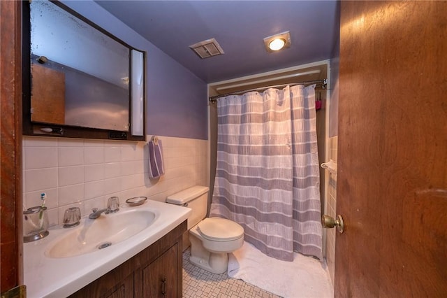117 Stoneys Ln, Lehigh Twp, PA 16063 - bathroom featuring vanity, tile walls, tile patterned floors, and curtained shower