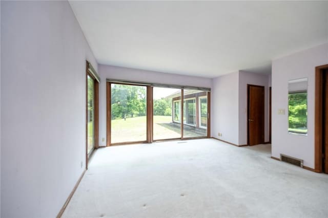 117 Stoneys Ln, Lehigh Twp, PA 16063 - spare room featuring healthy amount of natural light and light colored carpet