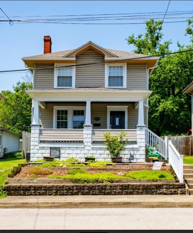 766 6th St, Beaver, PA 15009 - view of front of home with covered porch and a chimney