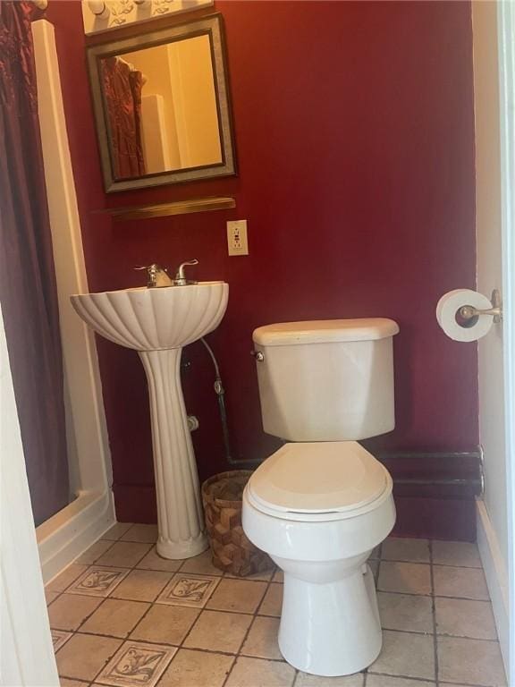 766 6th St, Beaver, PA 15009 - bathroom featuring toilet and tile patterned floors