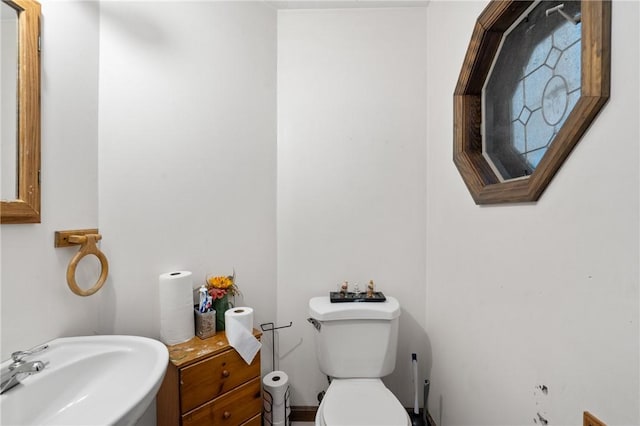 324 Linden Ave, Sharpsburg, PA 15215 - half bathroom featuring a sink and toilet