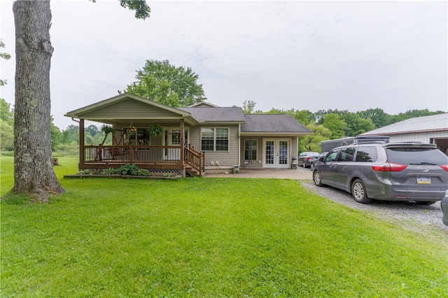 840 Sunol Rd, Deer Creek, PA 16314 - rear view of property with french doors, a lawn, a porch, and a shingled roof
