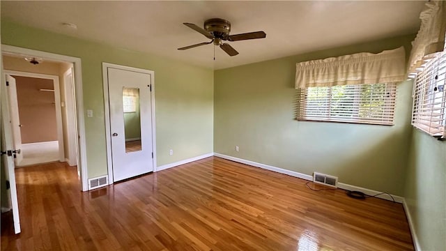 2231 Dellenbaugh Rd, Frazer, PA 15084 - unfurnished bedroom featuring multiple windows, wood finished floors, and ceiling fan