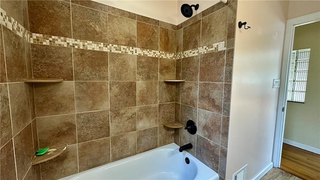 2231 Dellenbaugh Rd, Frazer, PA 15084 - bathroom featuring washtub / shower combination and wood finished floors