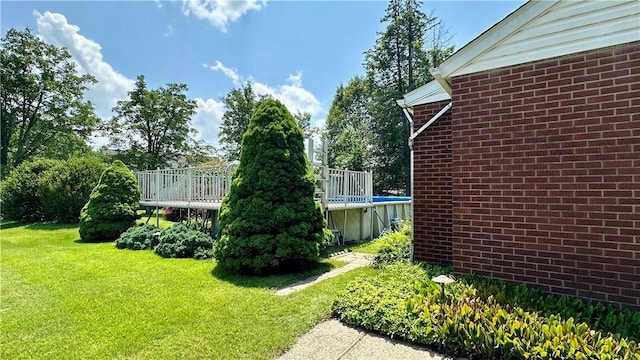2231 Dellenbaugh Rd, Frazer, PA 15084 - view of green lawn with a wooden deck