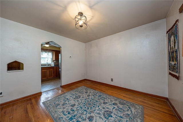 3037 Churchview, Baldwin Boro, PA 15227 - empty room with light wood-type flooring and arched walkways