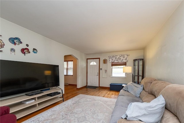 3037 Churchview, Baldwin Boro, PA 15227 - living area with plenty of natural light, arched walkways, and wood finished floors