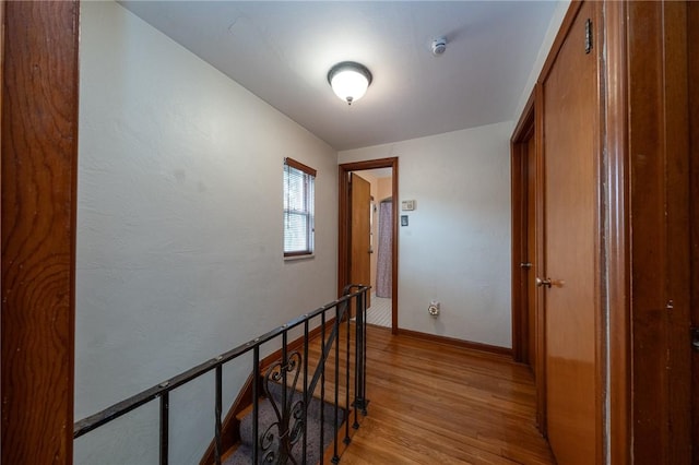 3037 Churchview, Baldwin Boro, PA 15227 - hallway featuring light wood-type flooring and an upstairs landing
