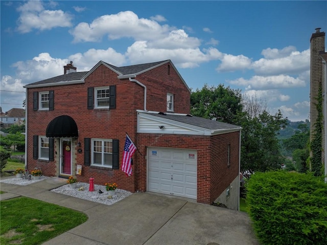 3037 Churchview, Baldwin Boro, PA 15227 - view of front of house featuring a chimney, brick siding, concrete driveway, and an attached garage