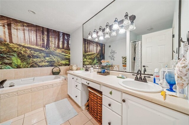 74 Quail Run, Unity Twp, PA 15601 - bathroom featuring tile patterned flooring, double vanity, and a garden tub