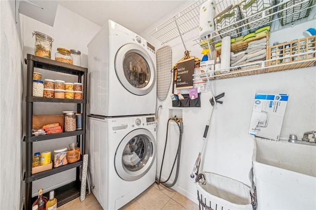 74 Quail Run, Unity Twp, PA 15601 - washroom featuring stacked washing machine and dryer and light tile patterned flooring