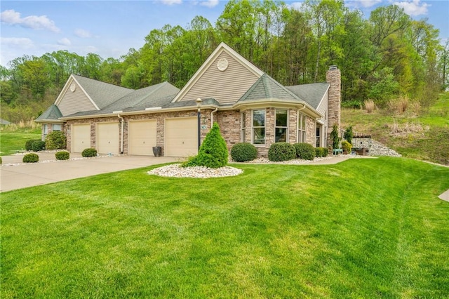 74 Quail Run, Unity Twp, PA 15601 - view of front of house featuring a garage, a front yard, a chimney, driveway, and stone siding