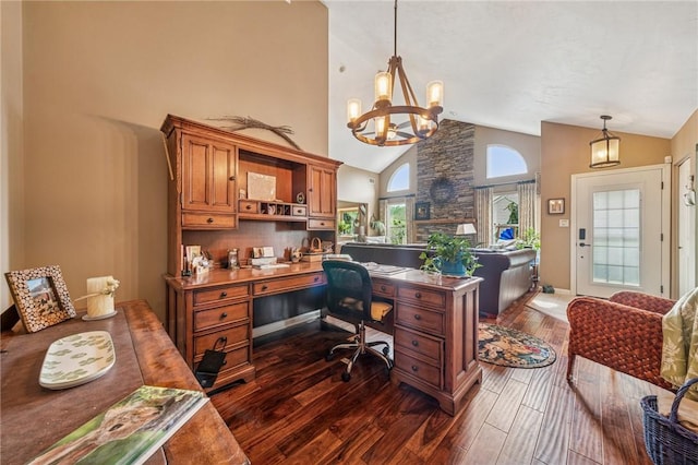 74 Quail Run, Unity Twp, PA 15601 - home office with high vaulted ceiling, dark wood-style floors, a chandelier, and built in desk