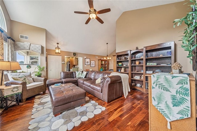74 Quail Run, Unity Twp, PA 15601 - living room featuring high vaulted ceiling, ceiling fan, wood finished floors, and a chandelier