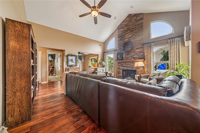 74 Quail Run, Unity Twp, PA 15601 - living room featuring high vaulted ceiling, a ceiling fan, dark wood finished floors, a fireplace, and plenty of natural light