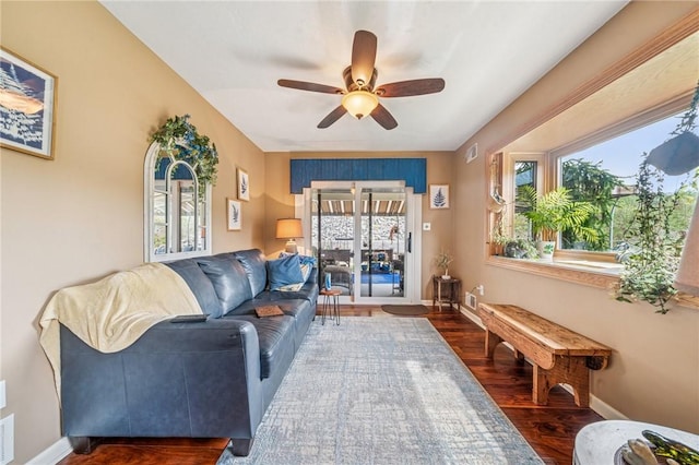 74 Quail Run, Unity Twp, PA 15601 - living room with healthy amount of natural light, dark wood-style flooring, and a ceiling fan
