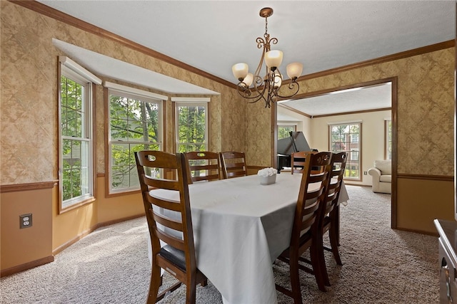 403 Lundy Ct, Cranberry Twp, PA 16066 - dining space featuring carpet, a chandelier, ornamental molding, and wallpapered walls