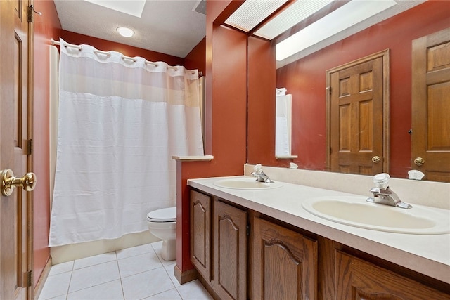403 Lundy Ct, Cranberry Twp, PA 16066 - full bathroom featuring tile patterned flooring, double vanity, shower / bath combo, and a skylight