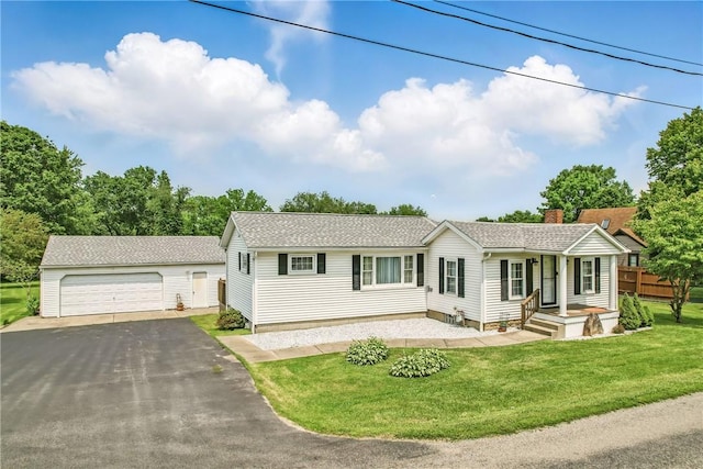 816 Wheatland Rd, Shenango Twp Mer, PA 16159 - single story home featuring a detached garage, an outdoor structure, a chimney, a front yard, and a shingled roof