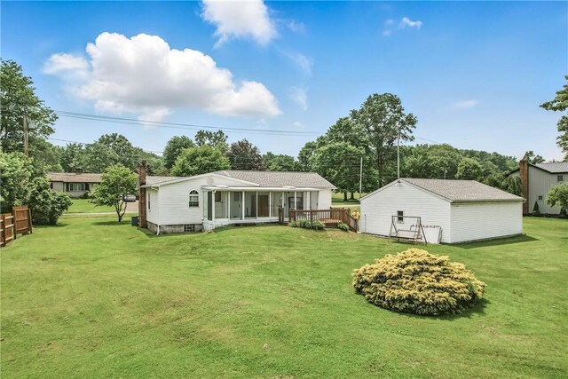 816 Wheatland Rd, Shenango Twp Mer, PA 16159 - rear view of property with a deck, a yard, and a sunroom