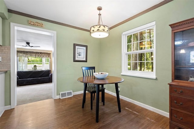 190 Wexford Bayne, Pine Twp Nal, PA 15090 - dining area featuring dark wood-style floors, ornamental molding, and a ceiling fan