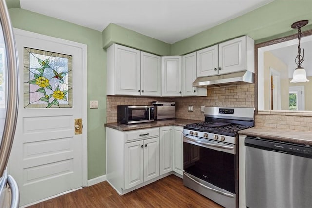 190 Wexford Bayne, Pine Twp Nal, PA 15090 - kitchen with stainless steel appliances, under cabinet range hood, dark wood finished floors, and white cabinetry