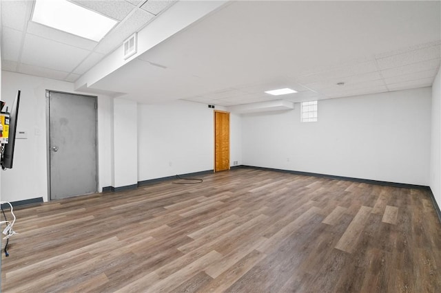 133 Hartwood Dr, Point Breeze, PA 15208 - basement with a drop ceiling and wood finished floors