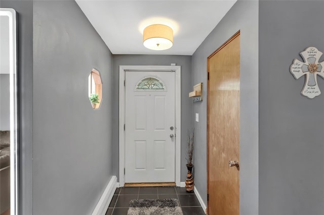 534 Ehman Ave, Baden, PA 15005 - entryway with dark tile patterned floors and baseboards